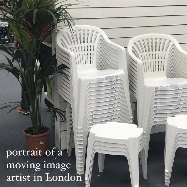 a stack of white platic garden centre chairs and a parlour palm. the text title is in the corner in white letters