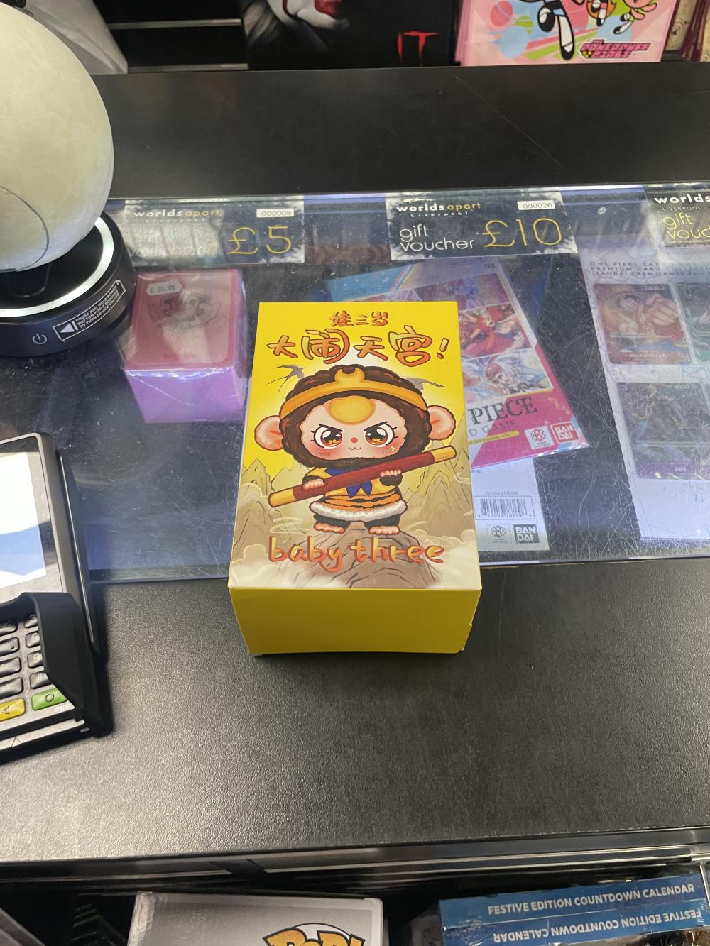 the baby three blind box on the counter