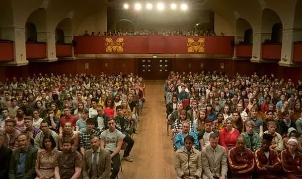 assembly with all the students looking up at their headteacher