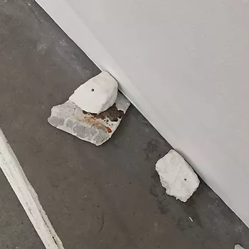 more white chunks on the floor