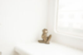 a gold frog figure