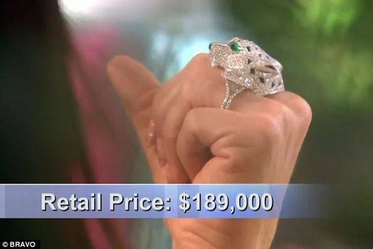 Erika&rsquo;s hand wearing a leopard diamond ring, chunky, retail price 189 thousand dollars