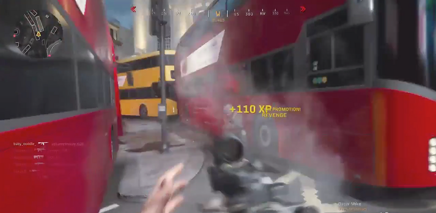 a busy frantic blurry image of a gun firing between two buses and +110XP revenge is shown on screen