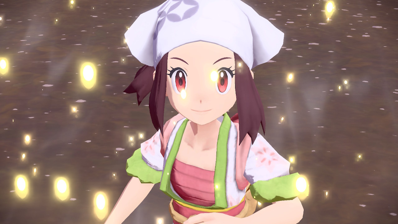 a young girl with a white half-headscarf on looks up while little glitters of magic sparkle all around her